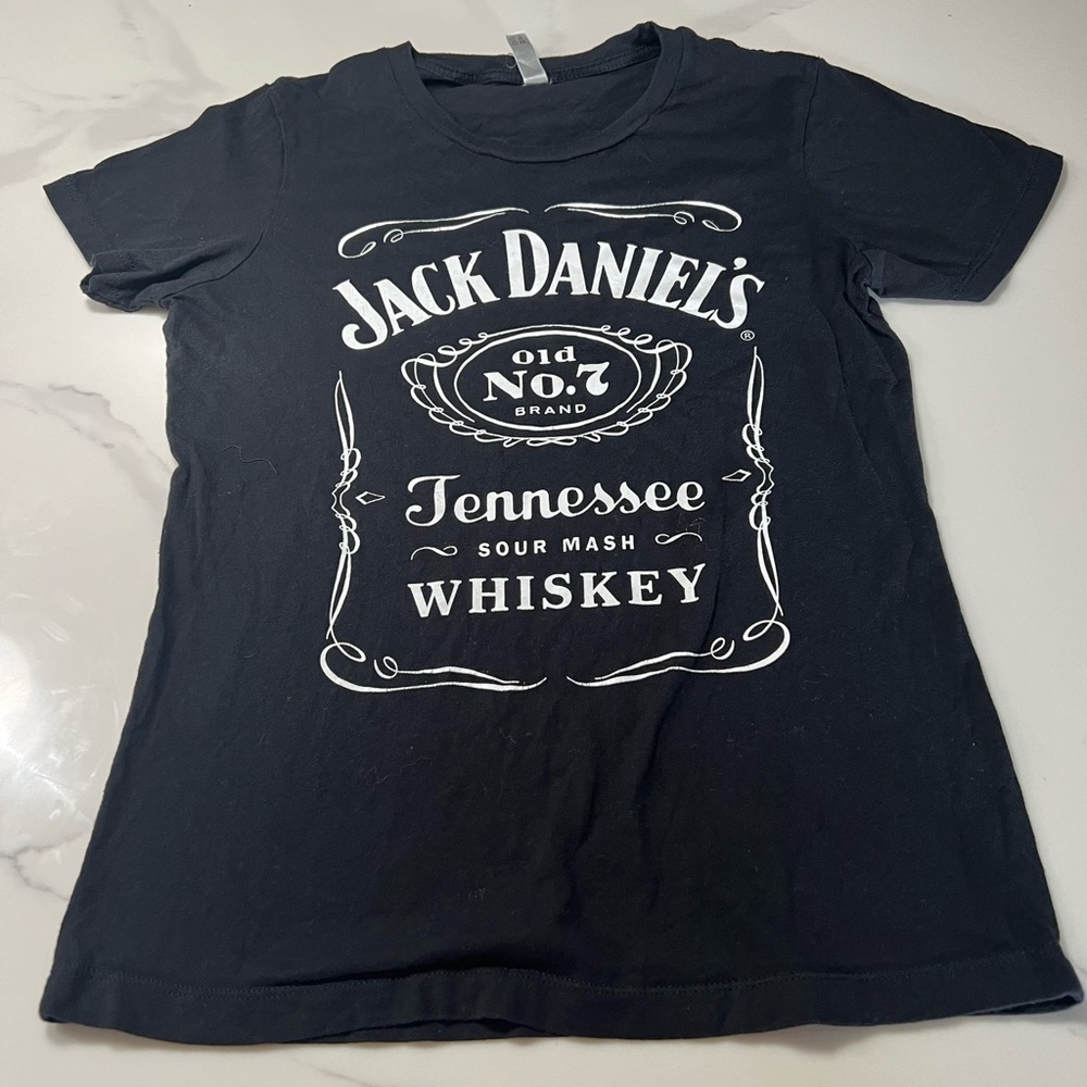 Jack Daniel’s black tee in good condition. Size Medium